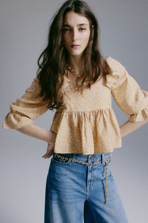 Blouse with ruffle trim